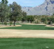 Omni Tucson National Catalina Course plays on largely flat ground below mountains.