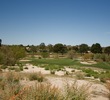 The par-3 13th hole on the Sonoran course at Omni Tucson National Golf Resort plays 169 yards. 