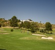 The par-5 11th hole on the Catalina course at Omni Tucson National Resort plays a dogleg right to a gently elevated green.