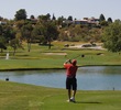 The famous 18th hole on the Catalina course at Omni Tucson National Resort begins with a difficult tee shot played between two water hazards.