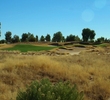 The par-3 fourth hole at Ak-Chin Southern Dunes G.C. has plenty of bunkers to help hide the flag.