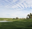 The fourth hole at Arizona Grand Golf Resort is a short par 4 that is defended by water. 
