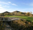 The 12th at Arizona Grand Golf Resort is a short par 3 that is guarded by desert wash.