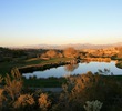 The par-3 14th hole plays from an elevated tee box at SunRidge Canyon. 