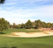 The par-4 13th hole at the Raven Golf Club - Phoenix is short but guarded by a large sand trap. 
