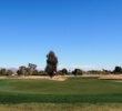 The sixth at Camelback Golf Club's Padre Course is a dogleg-right par 4 around a lake.