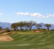 The 16th hole on the Devil's Claw Course at Whirlwind Golf Club is a long, uphill par 4 towards the mountains.