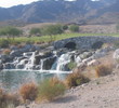 Verrado Golf Club's showy waterfall is visible on both the first and 18th holes.