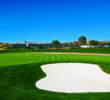 A large bunker guards the green on the short risk-reward par-4 17th at the TPC Scottsdale Stadium Course.