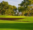 A wall and hazard front the green of the par-4 eighth on the Gold Course at The Wigwam resort in Litchfield Park, Arizona.