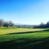 A sunny day view of a hole at Quintero Golf Club.