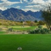 A view from a tee at MountainView Country Club with mountains in the distance.
