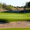 A sunny day view of a hole at Bear Creek Golf Complex.