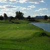 A view of a green with water coming into play at Silverbell Golf Course.