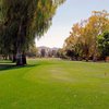 A view of a fairway with mountains in background at Orange Tree Golf Club.