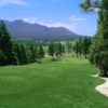 A view of a fairway with mountains in the distance at Elephant Rocks Golf Course.