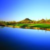 A view of a green with water and bunkers coming into play at Quintero Golf Club