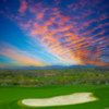 View of a bunker and green at Wickenburg Ranch Golf & Social Club