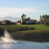 View of a green over water at Peoria Pines Golf Club