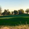 A sunny day view of a hole at Arizona Traditions Golf Club.