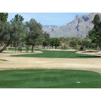 Omni Tucson National Catalina Course plays on largely flat ground below mountains.