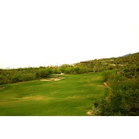 Arizona National Golf Club's 16th hole is a par 4 up the foothills to an elevated green. 