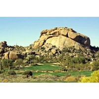The Boulders Resort's signature hole is the par-5 fifth hole on the South Course, playing toward the mighty boulder pile. 