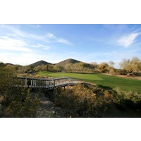 The 12th at Arizona Grand Golf Resort is a short par 3 that is guarded by desert wash.