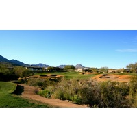 The seventh hole at SunRidge Canyon requires a carry over desert on the approach shot.