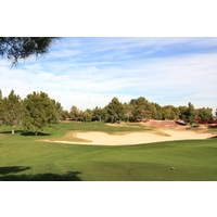 The par-4 13th hole at the Raven Golf Club - Phoenix is short but guarded by a large sand trap. 