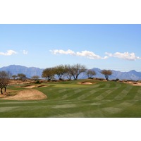 The 16th hole on the Devil's Claw Course at Whirlwind Golf Club is a long, uphill par 4 towards the mountains.