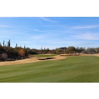 The par-5 second hole on the Cholla Course at We-Ko-Pa Golf Club swings right off the tee before bending back left.